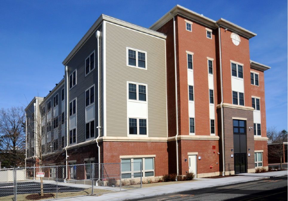 Modern apartment building under clear blue sky