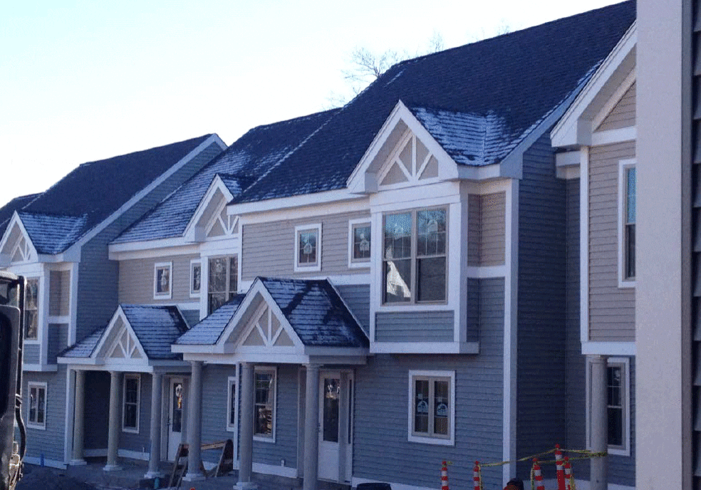 Modern townhouses with triangular gables