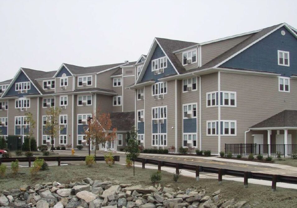 Multi-story apartments in suburban setting