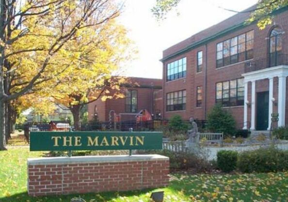Brick building with fall foliage